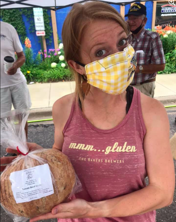 In Hot Water Coffee and Tea posing with some Diamond CIty Bread at the Annandale Farmers Market in central Minnesota